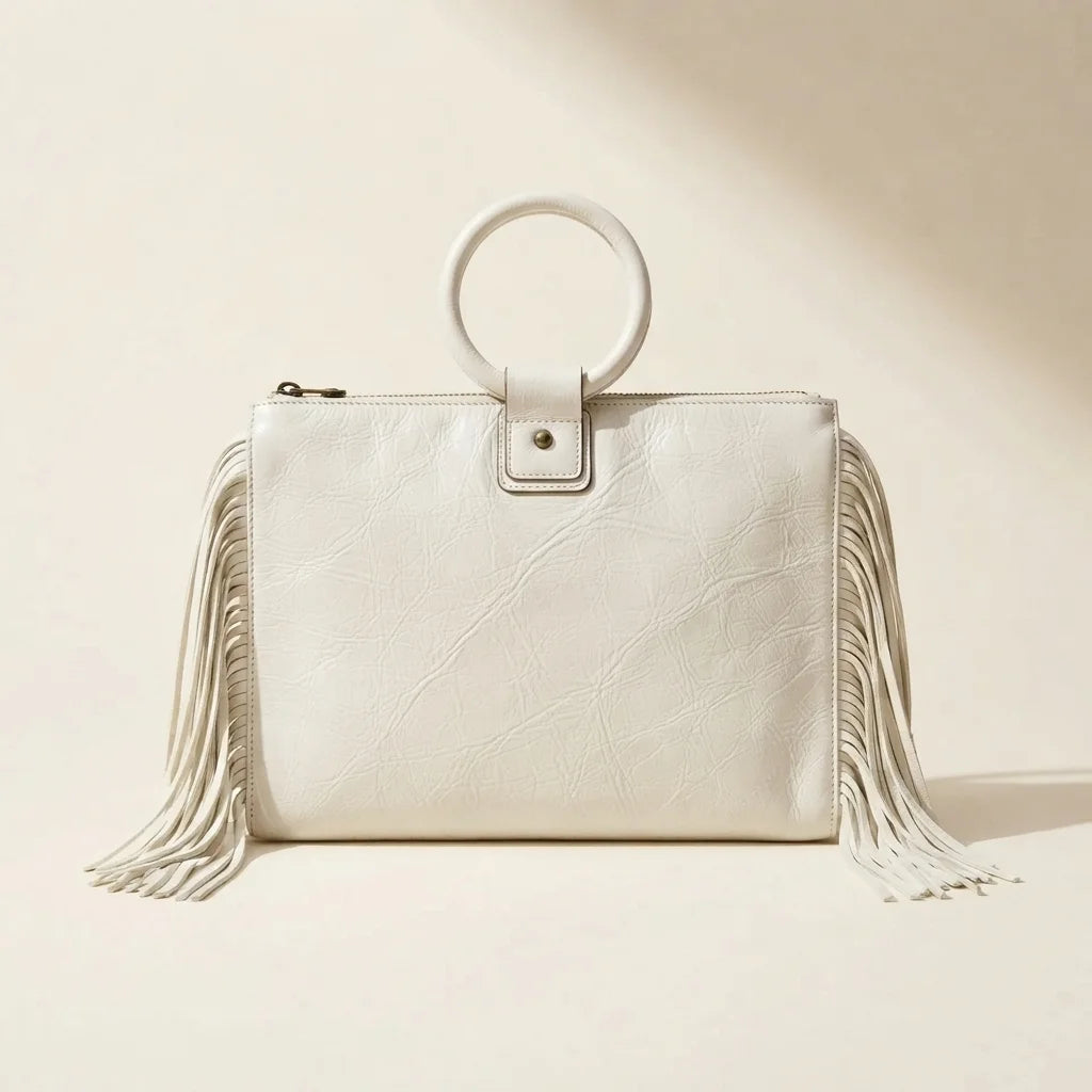 Back panel of White fringe clutch bag leather with strap attachments