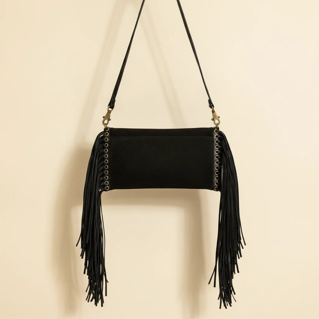 Back panel of Black fringe clutch crossbody bag with strap attachments