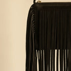 Close-up of fringe stitching and texture on Black fringe clutch crossbody bag