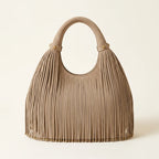 Beige fringe evening bag, front view