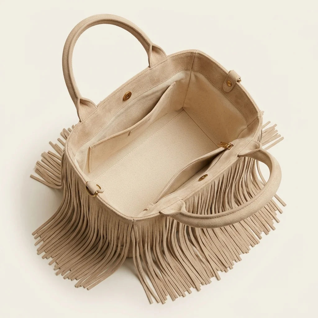 Interior lining and pockets of Beige fringe evening bag