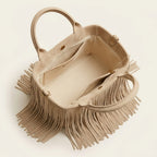 Interior lining and pockets of Beige fringe evening bag