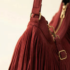 Close-up of fringe stitching and texture on Red fringe hobo bag red