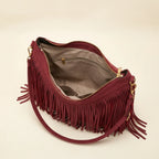 Interior lining and pockets of Red fringe hobo bag red