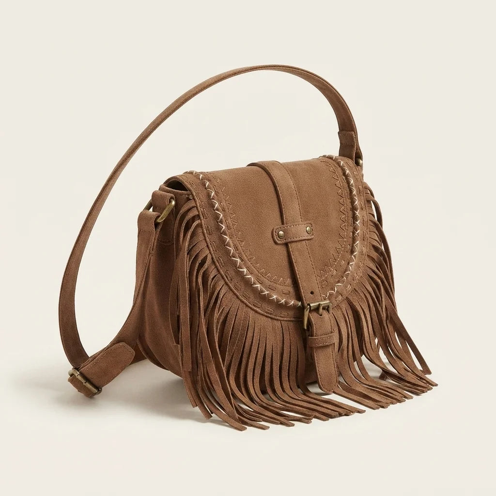 Brown fringe hobo crossbody bag, three-quarter angle showing side depth