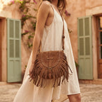 Woman wearing Brown fringe hobo crossbody bag with swaying fringe
