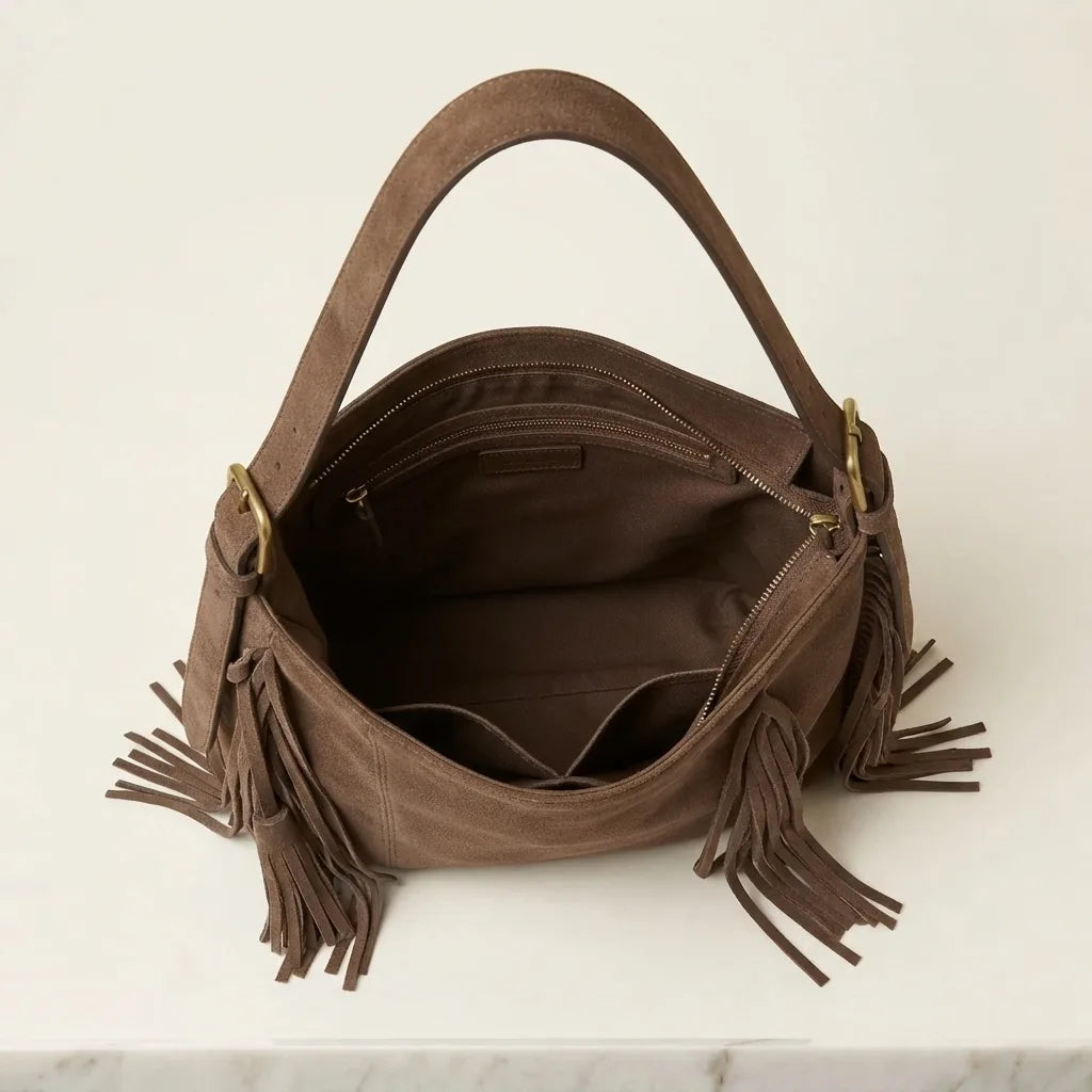 Interior lining and pockets of Brown fringe hobo shoulder bags
