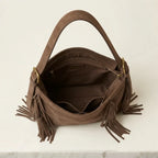 Interior lining and pockets of Brown fringe hobo shoulder bags