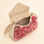 Interior lining and pockets of Floral fringe messenger bag