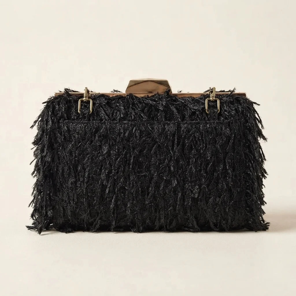 Back panel of Black fringe mini bag with strap attachments