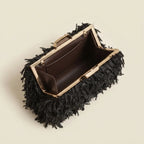 Interior lining and pockets of Black fringe mini bag