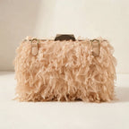 Back panel of Champagne fringe mini bag with strap attachments