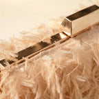 Close-up of fringe stitching and texture on Champagne fringe mini bag