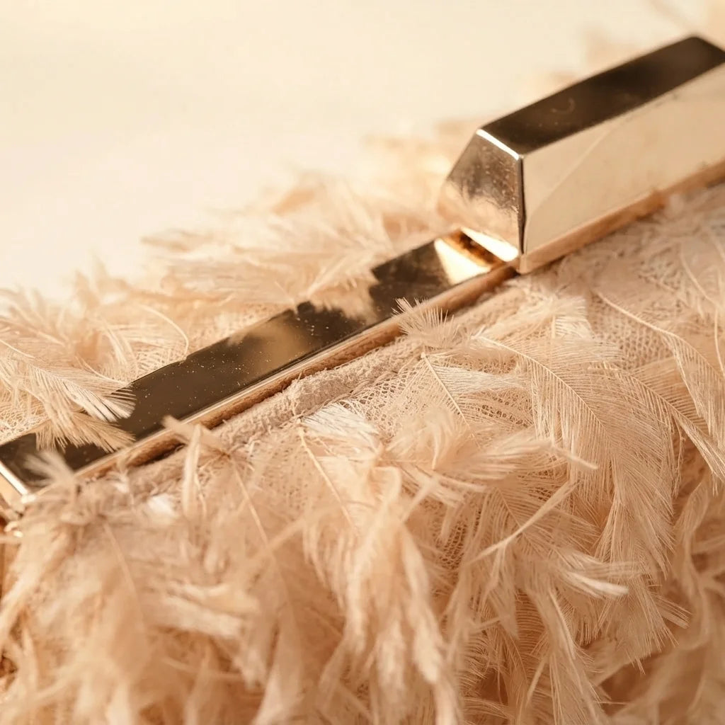Close-up of fringe stitching and texture on Champagne fringe mini bag