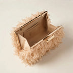 Interior lining and pockets of Champagne fringe mini bag