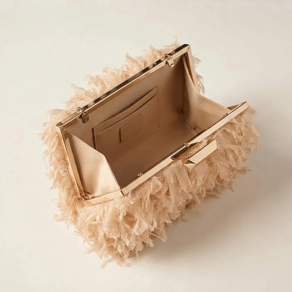 Interior lining and pockets of Champagne fringe mini bag