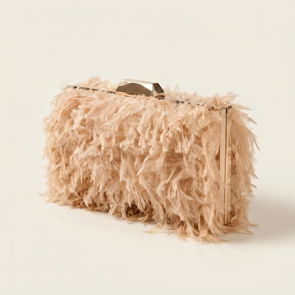 Champagne fringe mini bag, three-quarter angle showing side depth