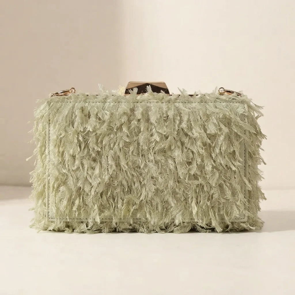 Back panel of Green fringe mini bag with strap attachments