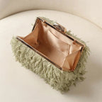 Interior lining and pockets of Green fringe mini bag
