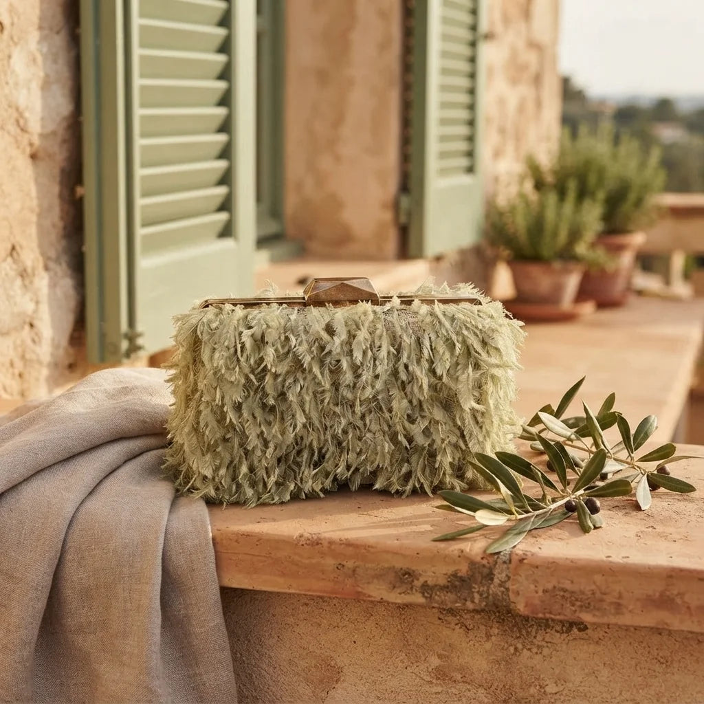 Green fringe mini bag styled in a warm Mediterranean setting