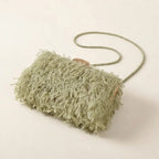 Green fringe mini bag, three-quarter angle showing side depth