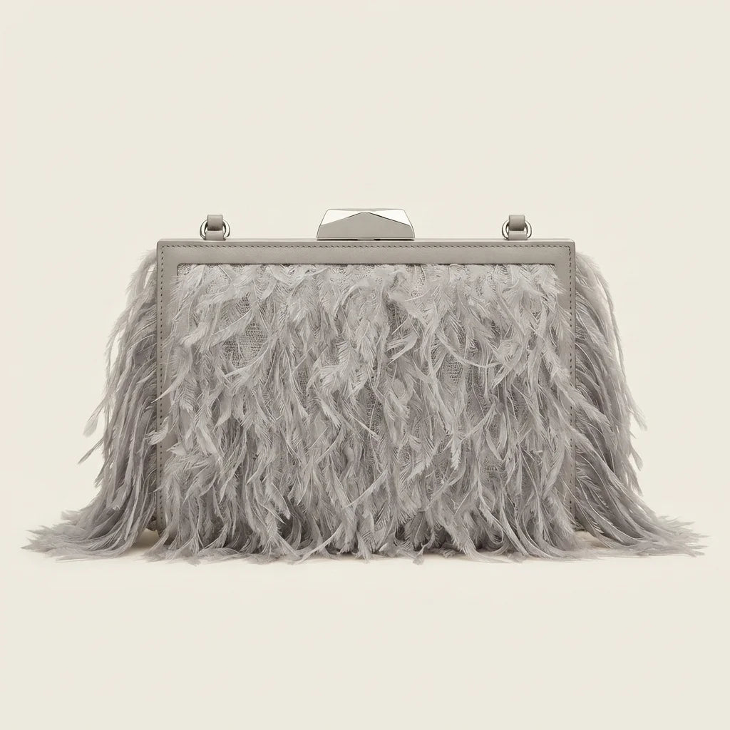 Back panel of Grey fringe mini bag with strap attachments
