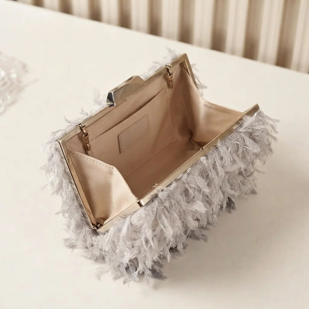 Interior lining and pockets of Grey fringe mini bag