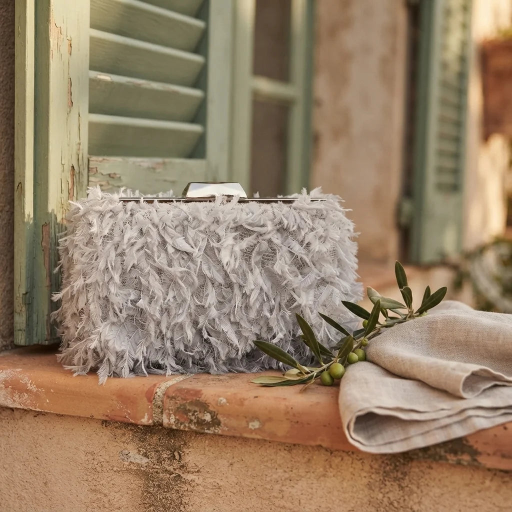 Grey fringe mini bag styled in a warm Mediterranean setting