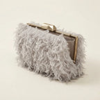 Grey fringe mini bag, three-quarter angle showing side depth