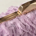 Close-up of fringe stitching and texture on Lavender fringe mini bag