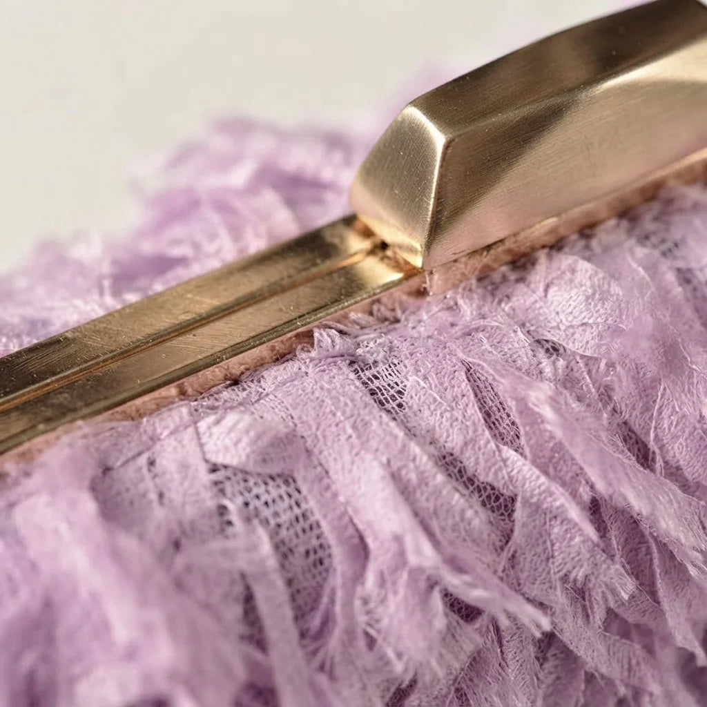 Close-up of fringe stitching and texture on Lavender fringe mini bag
