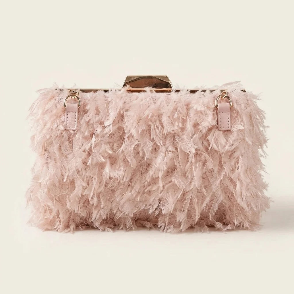 Back panel of Pink fringe mini bag with strap attachments