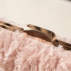 Close-up of fringe stitching and texture on Pink fringe mini bag