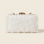 Back panel of White fringe mini bag with strap attachments