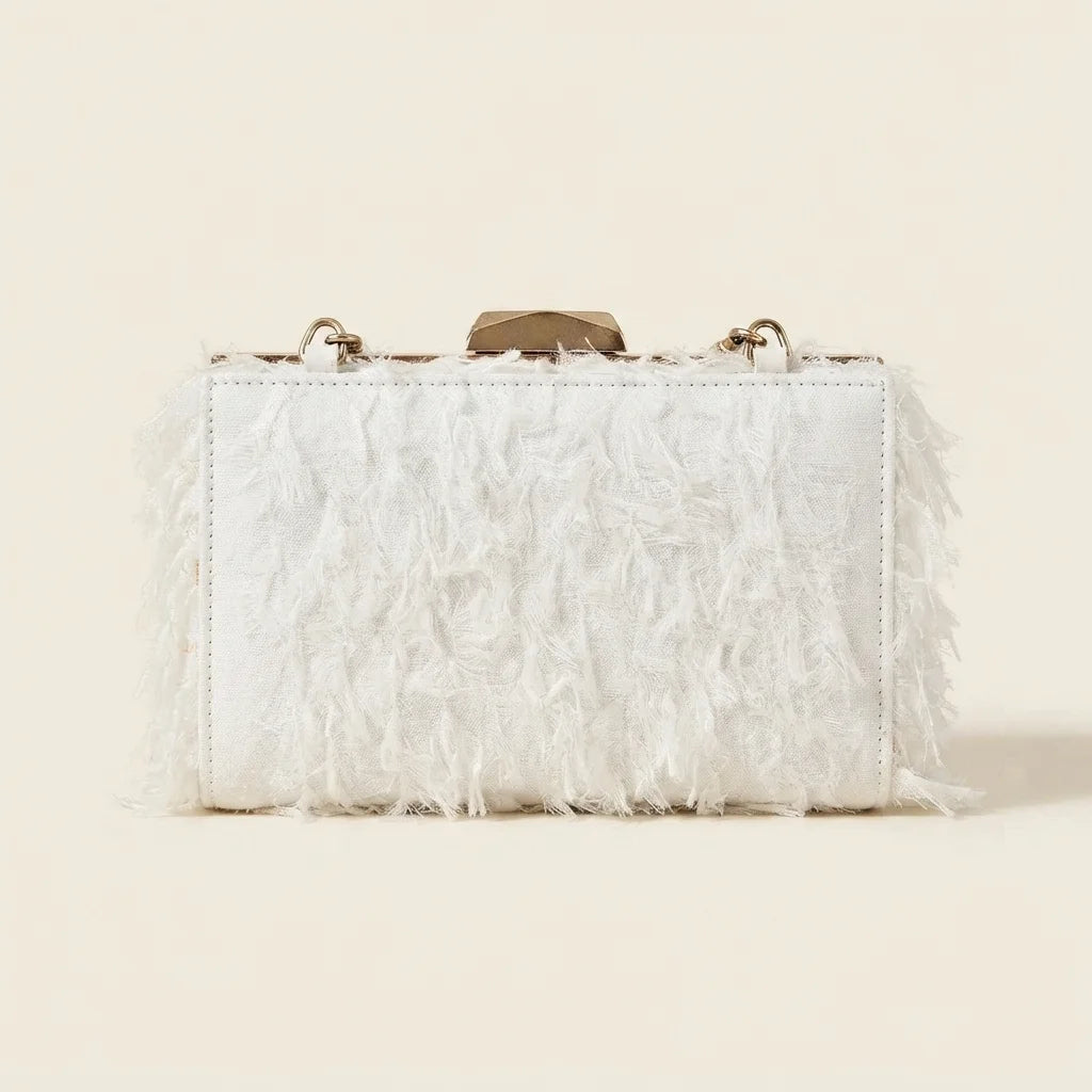Back panel of White fringe mini bag with strap attachments