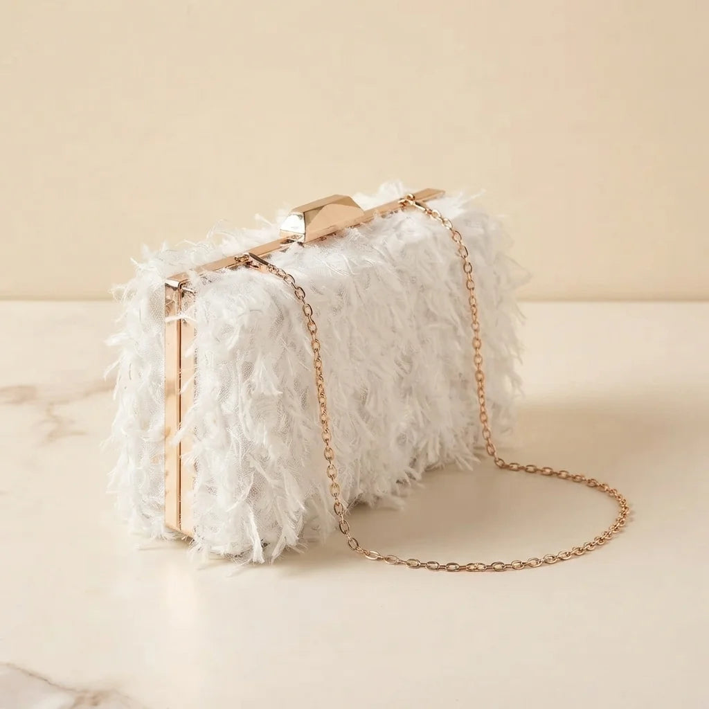 White fringe mini bag, three-quarter angle showing side depth