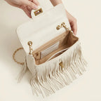 Interior lining and pockets of White fringe over shoulder bag