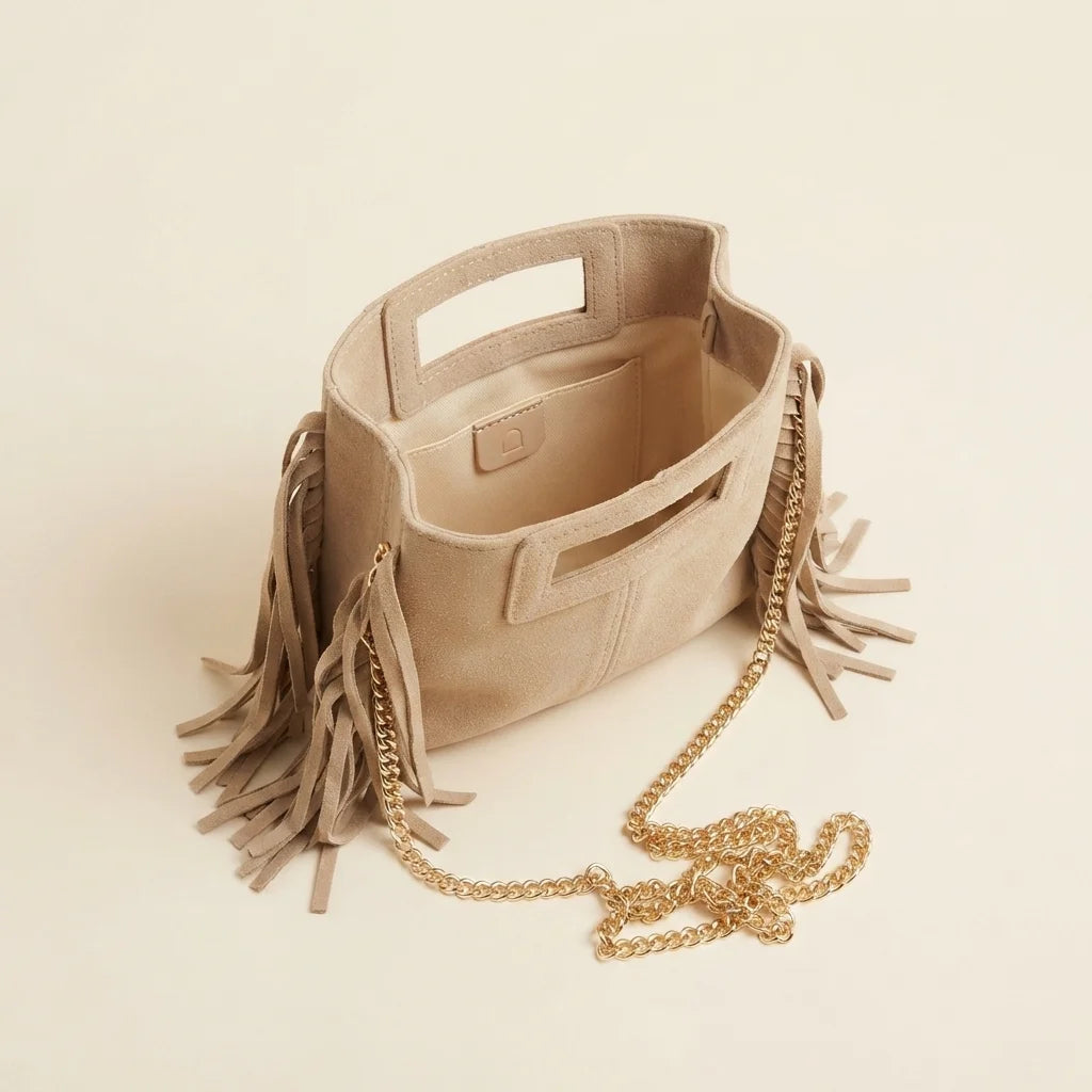 Interior lining and pockets of Beige fringe satchel bag