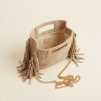 Interior lining and pockets of Beige fringe satchel bag