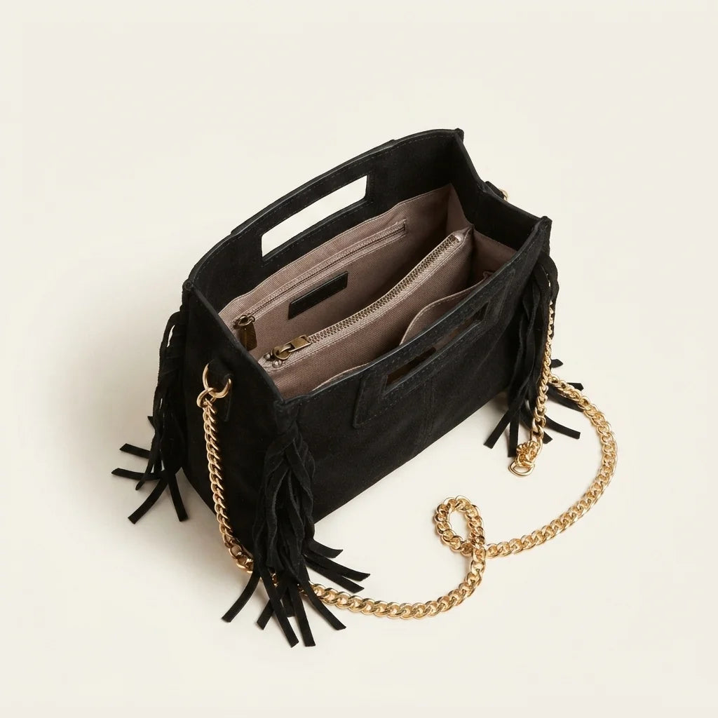 Interior lining and pockets of Black fringe satchel bag