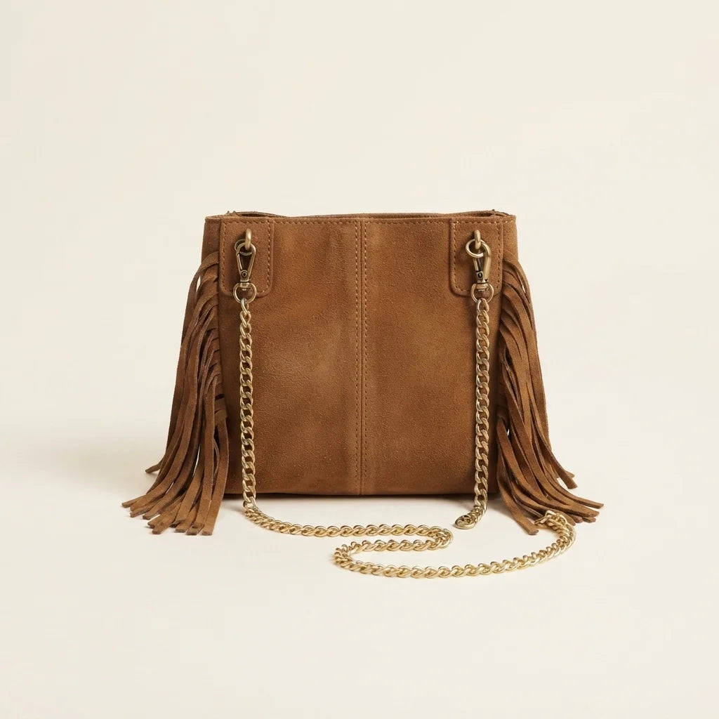 Back panel of Camel fringe satchel bag with strap attachments
