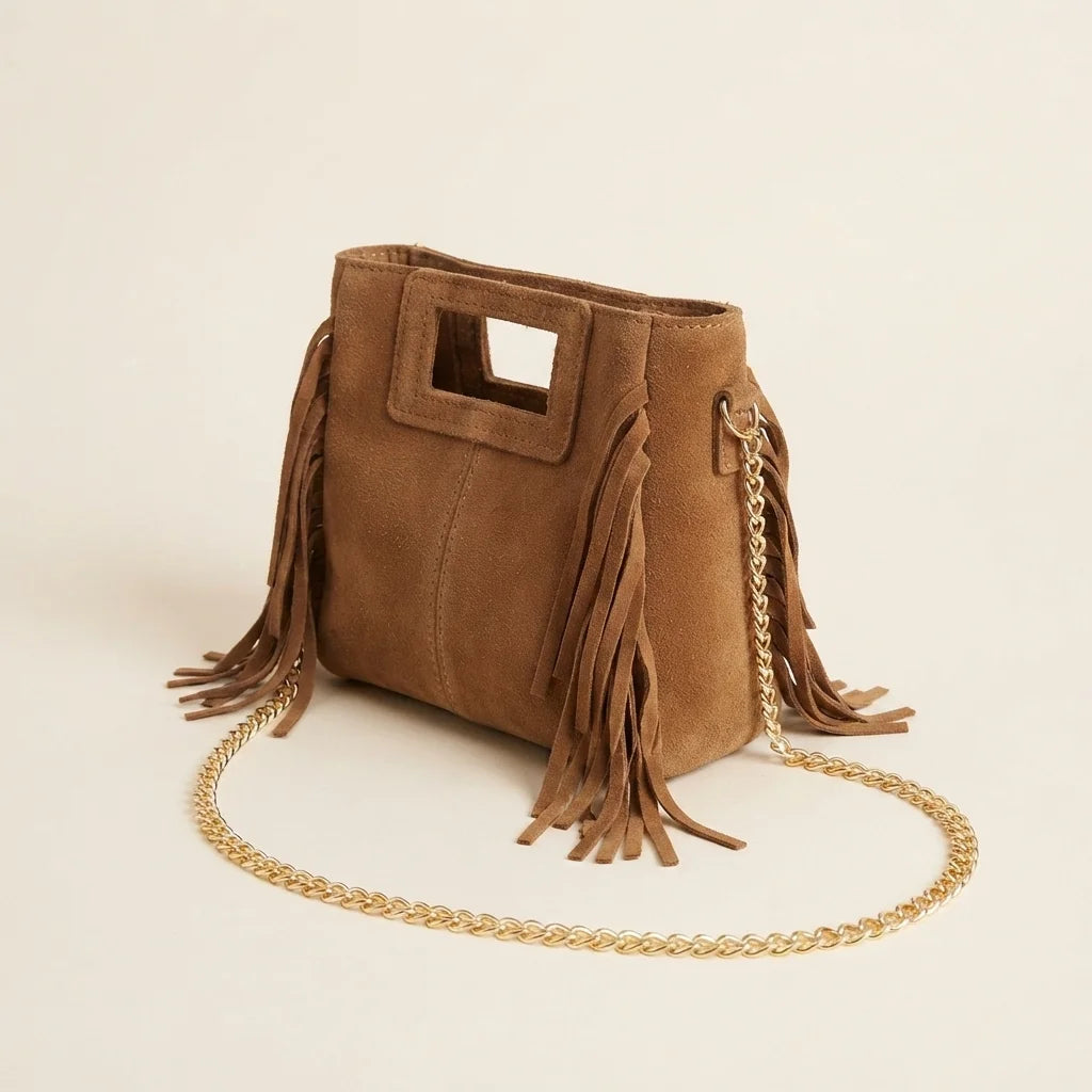 Camel fringe satchel bag, three-quarter angle showing side depth