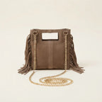 Back panel of Taupe fringe satchel bag with strap attachments