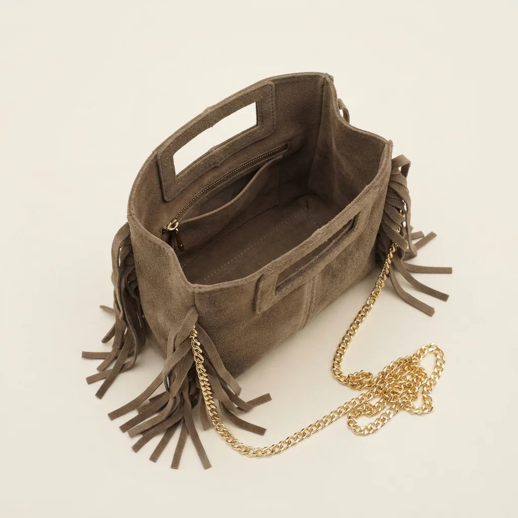 Interior lining and pockets of Taupe fringe satchel bag