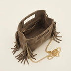Interior lining and pockets of Taupe fringe satchel bag