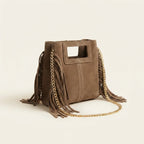 Taupe fringe satchel bag, three-quarter angle showing side depth