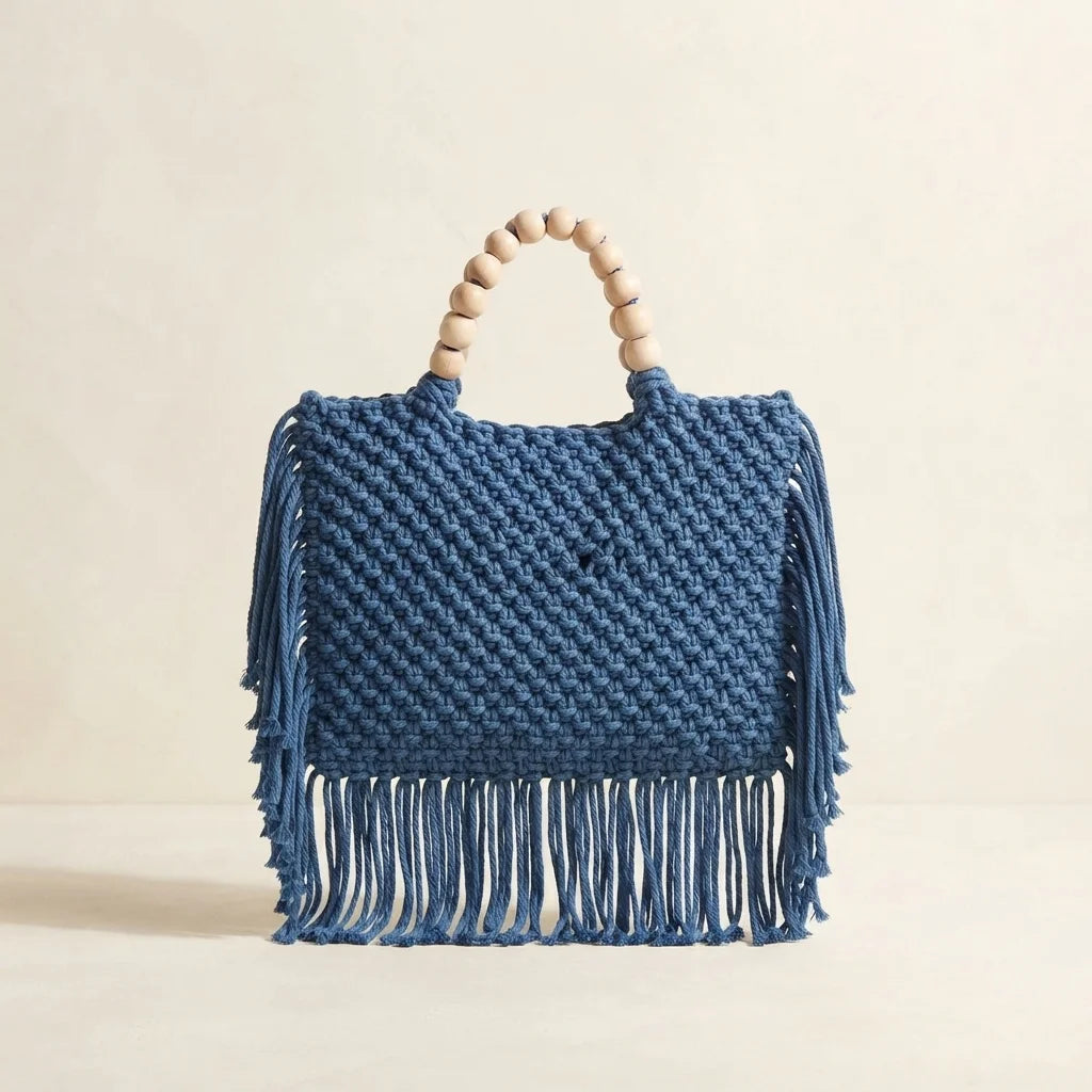 Back panel of Blue fringe shoulder bag with tassels with strap attachments