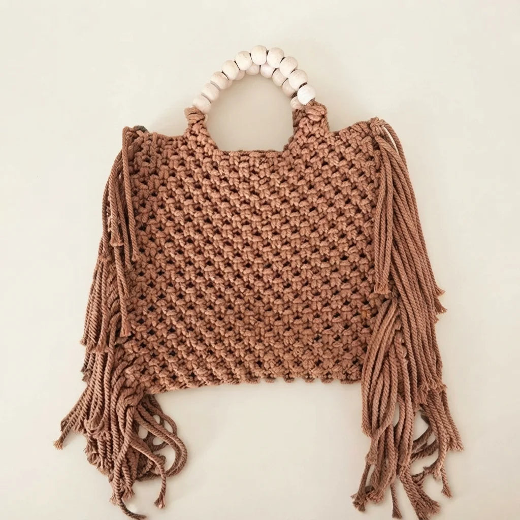 Back panel of Brown fringe shoulder bag with tassels with strap attachments