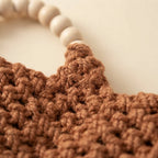 Close-up of fringe stitching and texture on Brown fringe shoulder bag with tassels
