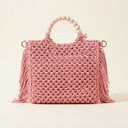Back panel of Pink fringe shoulder bag with tassels with strap attachments